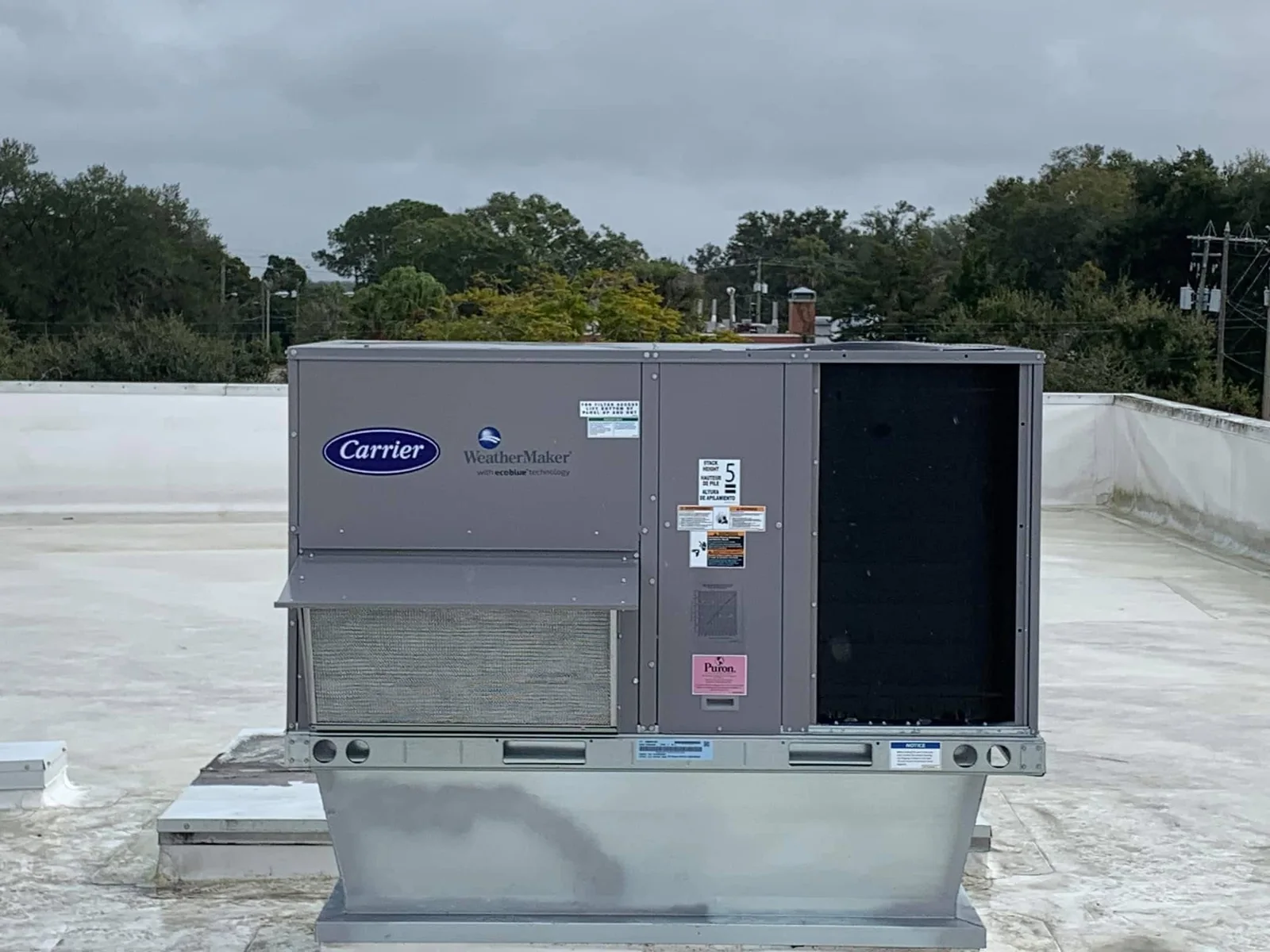 Carrier commercial rooftop HVAC unit serviced by Anchored A/C & Heating in Polk County FL